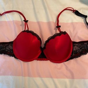 Red satin, black lace bra